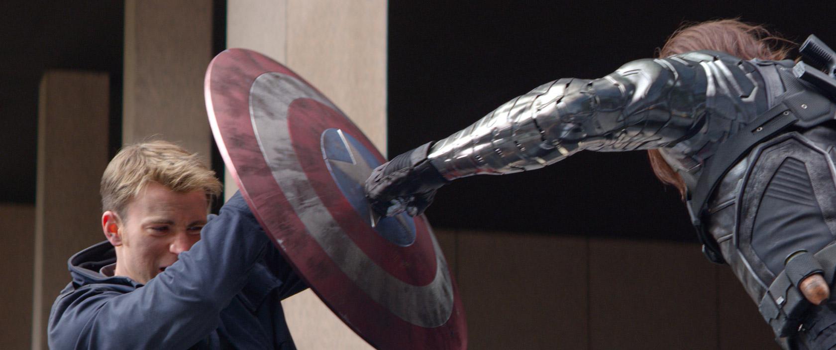 Captain-America-The-Winter-Soldier-Official-Photo-Bucky-punching-Shield.jpg