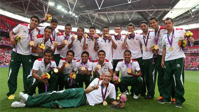 News_9544_Mexico team with Olympic Gold medal.jpg