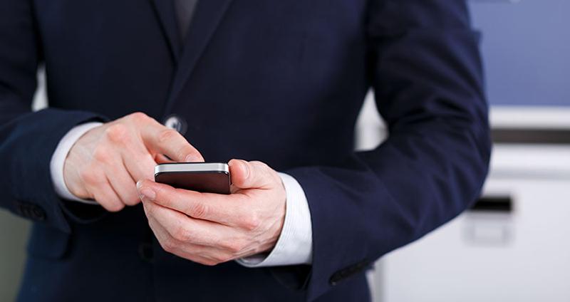 CEO-Holding-A-Cell-Phone.jpg