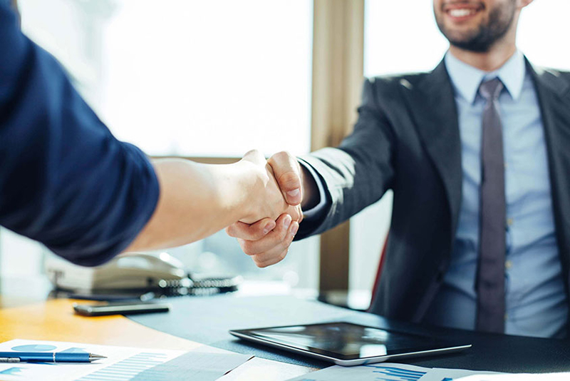Businessmen-handshaking-after-successful-negotiation.jpg